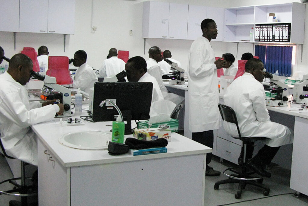 Nigerian lab technicians undergo malaria microscopy mentoring with the U.S. Army Research Unit-Kenya’s Malaria Diagnostics and Control Center of Excellence specialists at a Nigerian Air Force hospital near Lagos, Nigeria. : U.S. Army photo by Rick Scavetta