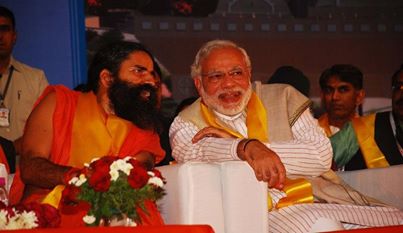 Indian yoga entrepreneur and businessman Baba Ramdev launched a swadeshi WhatsApp lookalike, Kimbho, in 2018.  He is pictured here in 2014 with Narendra Modi. : Narendra Modi/Flickr