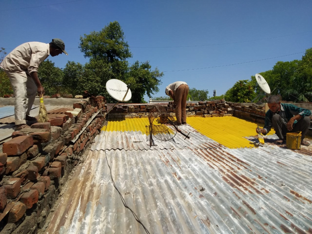 Coatings that reflect heat have been found to lower slum dwelling temperatures by up to 5 degrees. : Ahmedabad Municipal Corporation For use only with this article