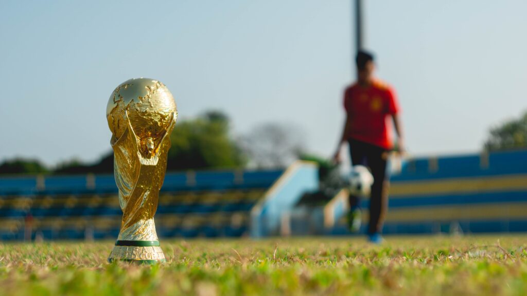 The upcoming men’s FIFA World Cup has been marred by allegations of labour abuses. : Fauzan Saari, History Of Soccer Unsplash licence (https://unsplash.com/license)