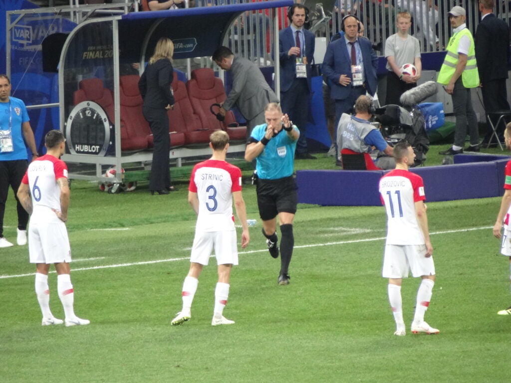 Referee Nestor Pitana awards a penalty to France against Croatia in 2018 after watching a Video Assistant Referee (VAR) replay. : Ben Sutherland CC BY 2.0