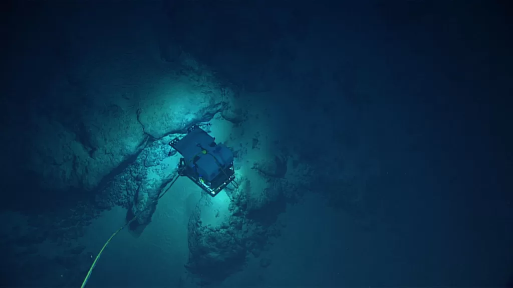Deep-sea mining technology is a new field and researchers want more data on its impacts. : ‘ROV at ferromanganese-encrusted outcrop’ by NOAA Ocean Exploration is available at https://tinyurl.com/yzvc34nc CC BY-SA 2.0