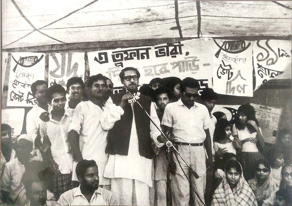 Sheikh Mujibur Rahman (centre with glasses) was not willing to take home anything short of an endorsement of his legitimate electoral victory in the general election of 1970, paving the way for the establishment of Bangladesh. Public Domain