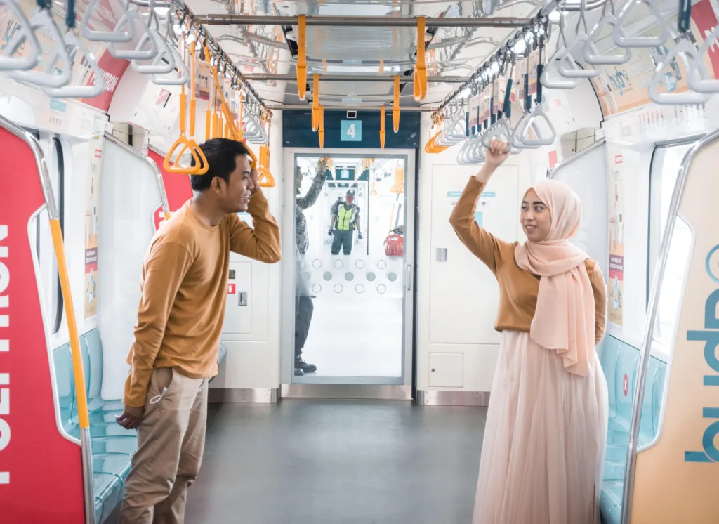 Living together should find a balance in Indonesia’s law : “Couple Happy Train” by IqbalStock is available in https://bit.ly/4aoidQ0″ Free for use under the Pixabay Content License