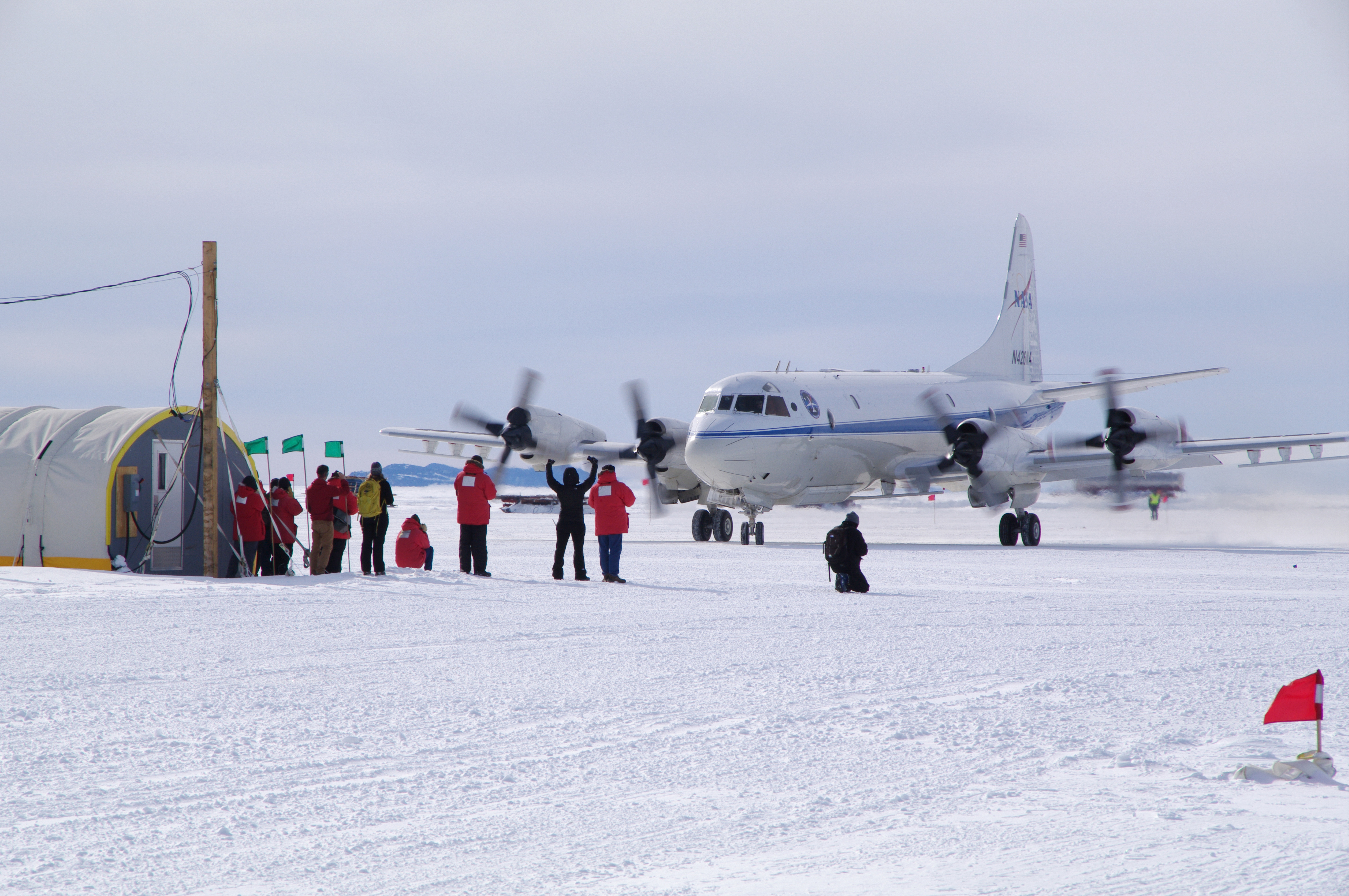 Many supplies for Antarctic research stations need to be brought in by plane. The  costs of keeping the stations running and their crews fed and housed are as extreme as the environment itself. : Flickr: NASA/Justin Miller/Indiana University CC BY 2.0