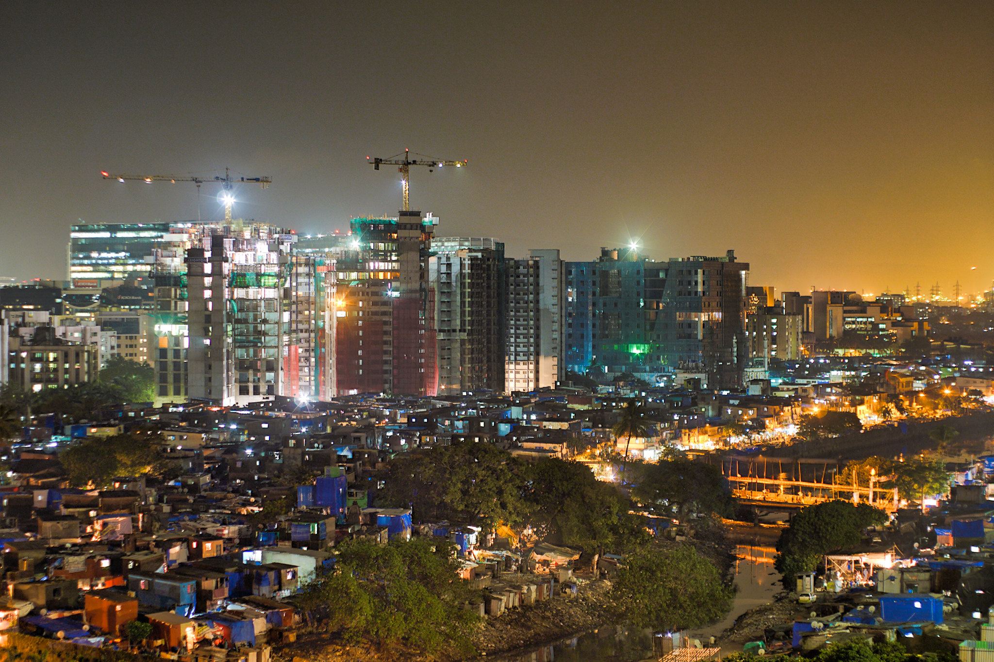 High-rise apartments in Mumbai are an outward sign of India’s growing prosperity, but challenges with wealth distribution and unemployment linger. : Logan King / Flickr