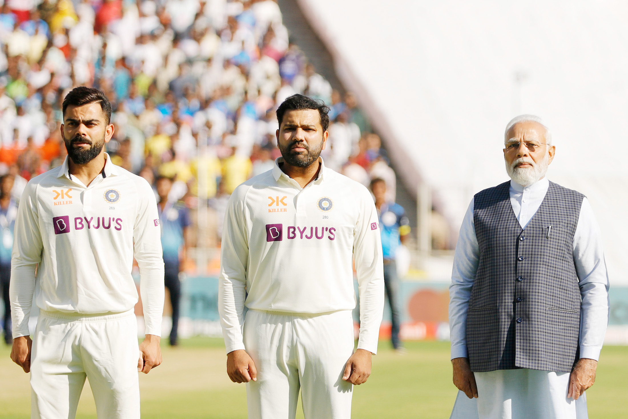 Narendra Modi stands alongside Virat Kohli and Rohit Sharma during the India vs Australia 4th Test match at Narendra Modi Stadium at Ahemdabad, in Gujarat on March 09, 2023. : By Prime Minister’s Office GODL-India