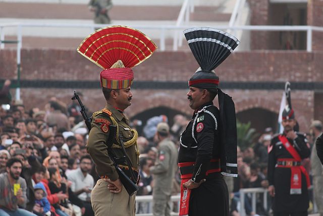 Beating retreat ceremony at India-Pakistan border at Wahgah.  India’s defence budget is ten times that of Pakistan’s. : Wikimedia Commons https://creativecommons.org/licenses/by-sa/4.0/